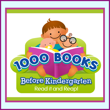 1,000 Books Before Kindergarten image of a small child holding an open book