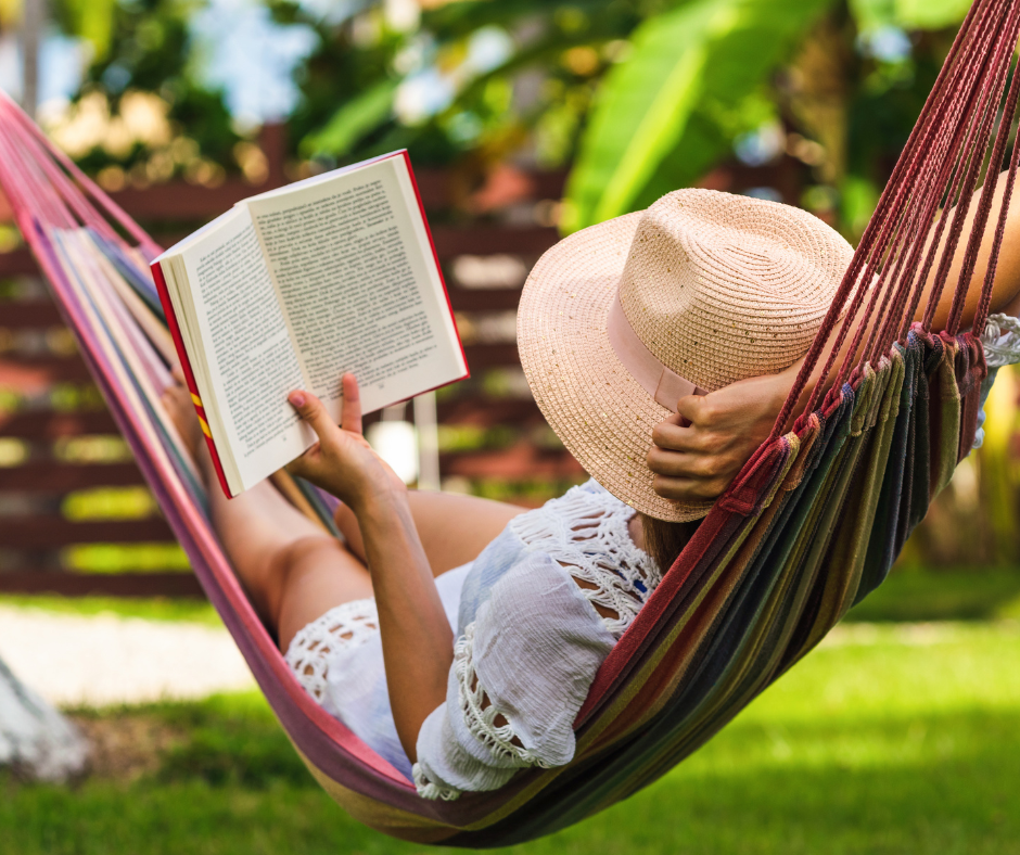 Woman reading in hammock
