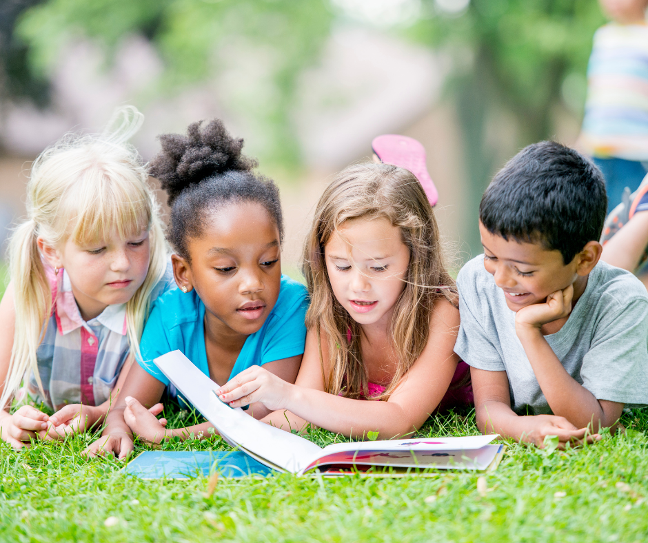 Kids reading outside